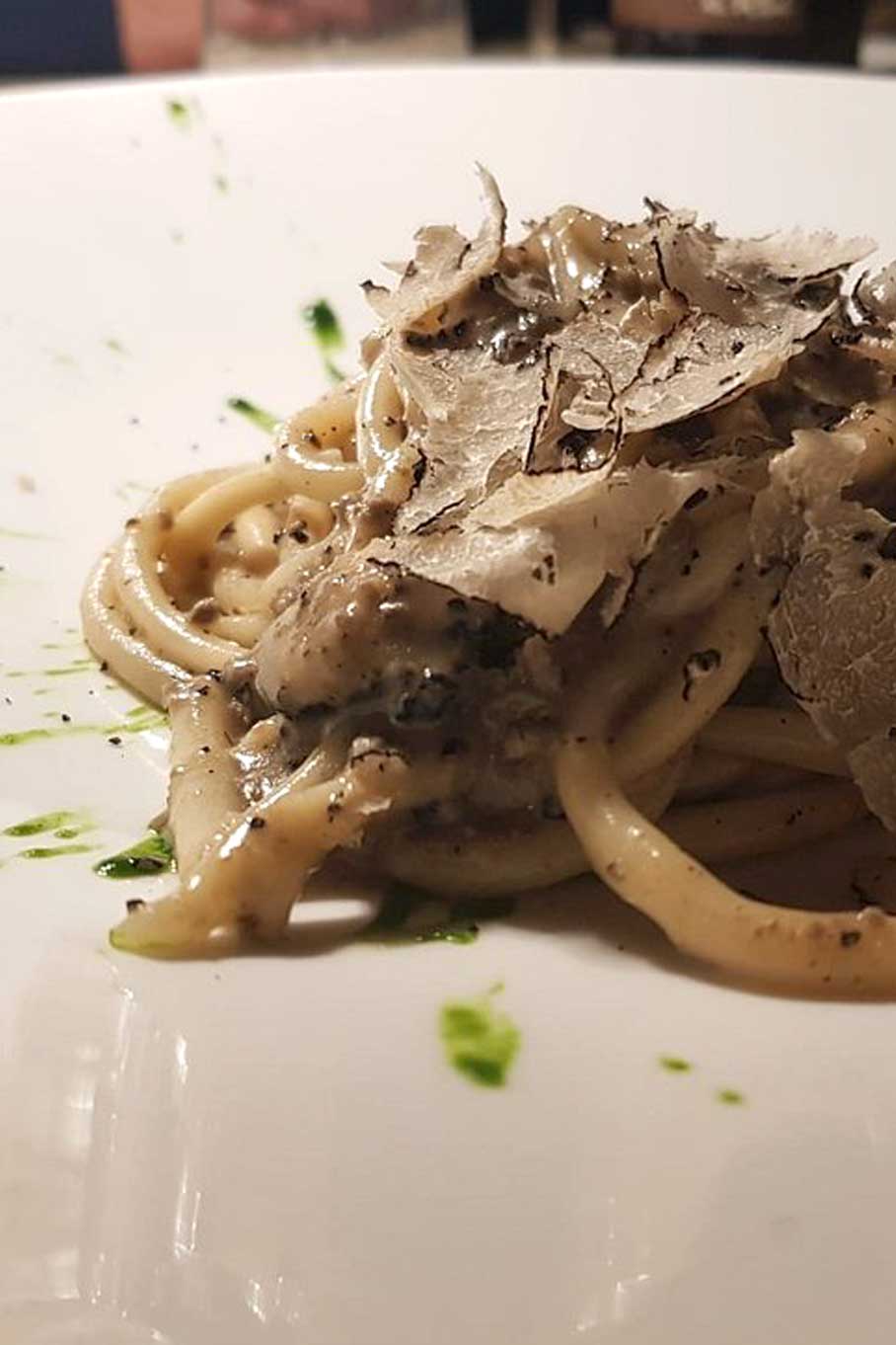 Handmade bringoli pasta with black truffle and wild herb pesto – Tipico Osteria Montone